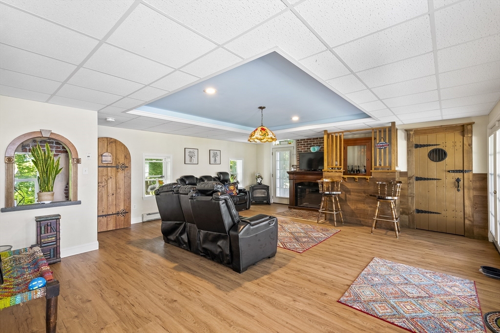 13 Coombs Street Southbridge, MA 01550 - Photo 22 of 41 a living room with furniture windows and wooden floor
