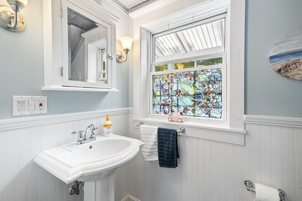 13 Coombs Street Southbridge, MA 01550 - Photo 24 of 41 a bathroom with a sink and a window