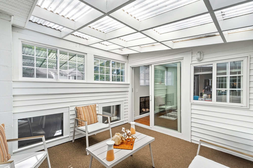 13 Coombs Street Southbridge, MA 01550 - Photo 25 of 41 a living room with furniture and a fireplace