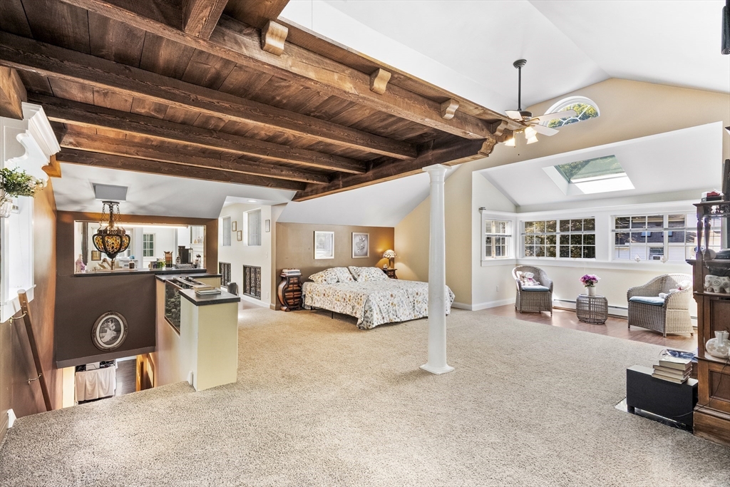 13 Coombs Street Southbridge, MA 01550 - Photo 29 of 41 a view of a livingroom with furniture and a ceiling fan