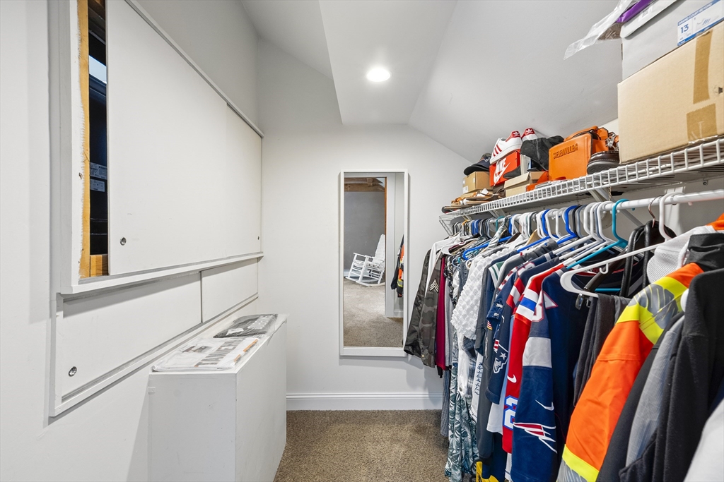 13 Coombs Street Southbridge, MA 01550 - Photo 34 of 41 a view of walk in closet with clothes and shoes