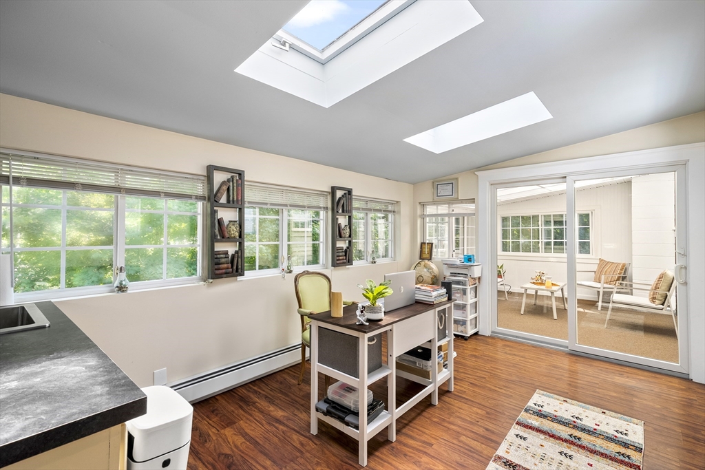 13 Coombs Street Southbridge, MA 01550 - Photo 36 of 41 a living room with furniture and a table