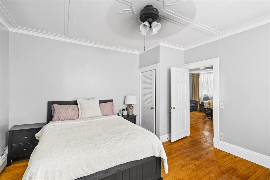 13 Coombs Street Southbridge, MA 01550 - Photo 40 of 41 a bedroom with a bed and a walk in closet