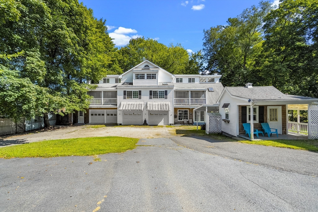 13 Coombs Street Southbridge, MA 01550 - Photo 4 of 41 a front view of a house with swimming pool
