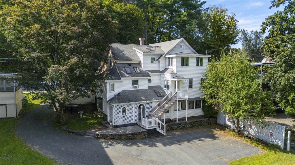 13 Coombs Street Southbridge, MA 01550 - Photo 6 of 41 an aerial view of a house with a yard