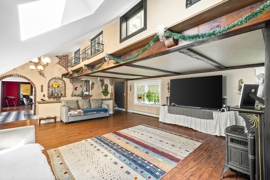 13 Coombs Street Southbridge, MA 01550 - Photo 10 of 41 a bedroom with furniture and a flat screen tv