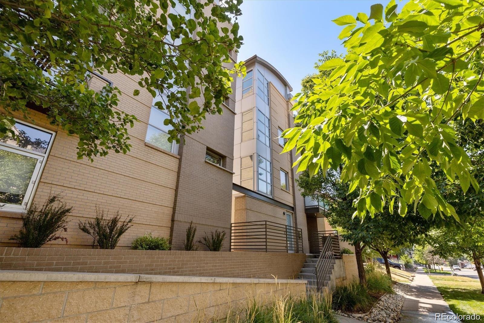2312 South University Boulevard Denver, CO 80210 - Photo 1 of 23 a plant that is sitting in front of a house