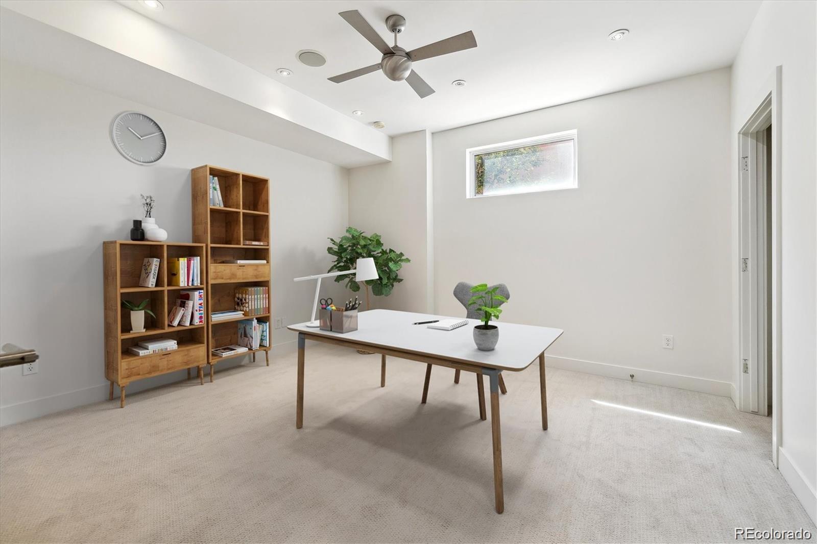 2312 South University Boulevard Denver, CO 80210 - Photo 13 of 23 a workspace with furniture and window