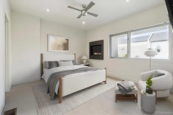 a bedroom with a bed and furniture