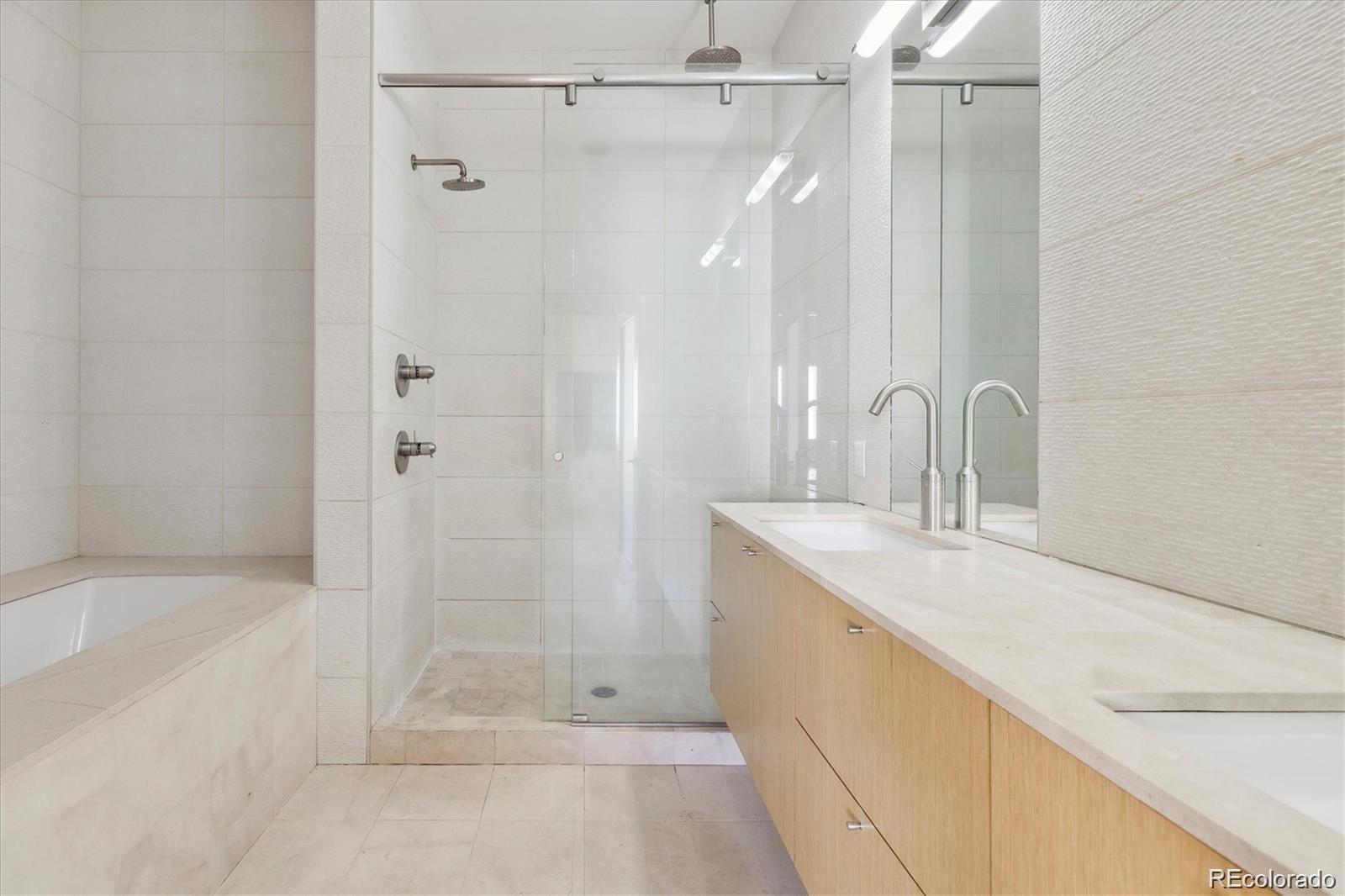 2312 South University Boulevard Denver, CO 80210 - Photo 9 of 23 a bathroom with a shower and a sink