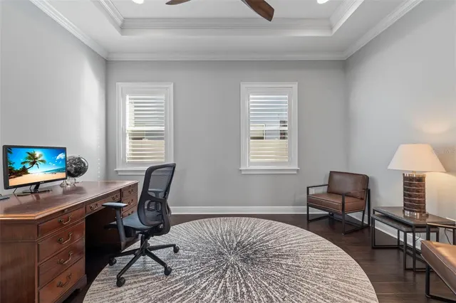 a kitchen with stainless steel appliances granite countertop a stove and a white cabinets