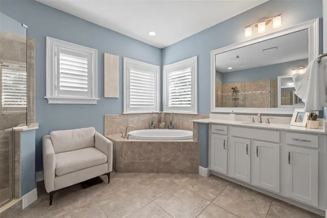 a bathroom with a toilet a sink and a mirror