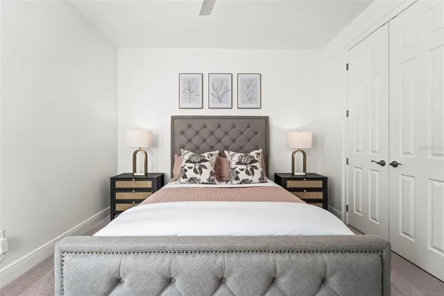 a bedroom with a bed and furniture