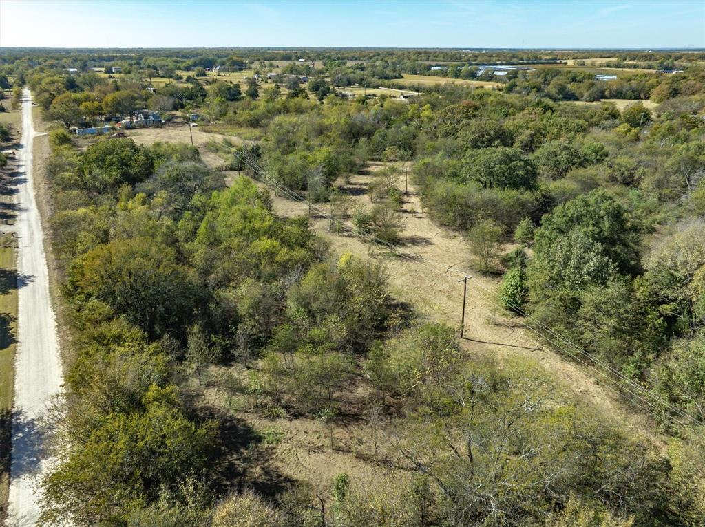 2805 County Road 3507 Wills Point, TX 75169 - Photo 12 of 16 a view of a city with lush green forest