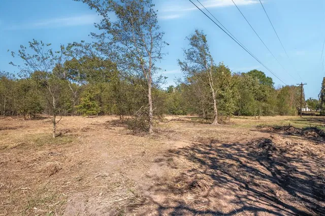 a view of a yard covered with snow