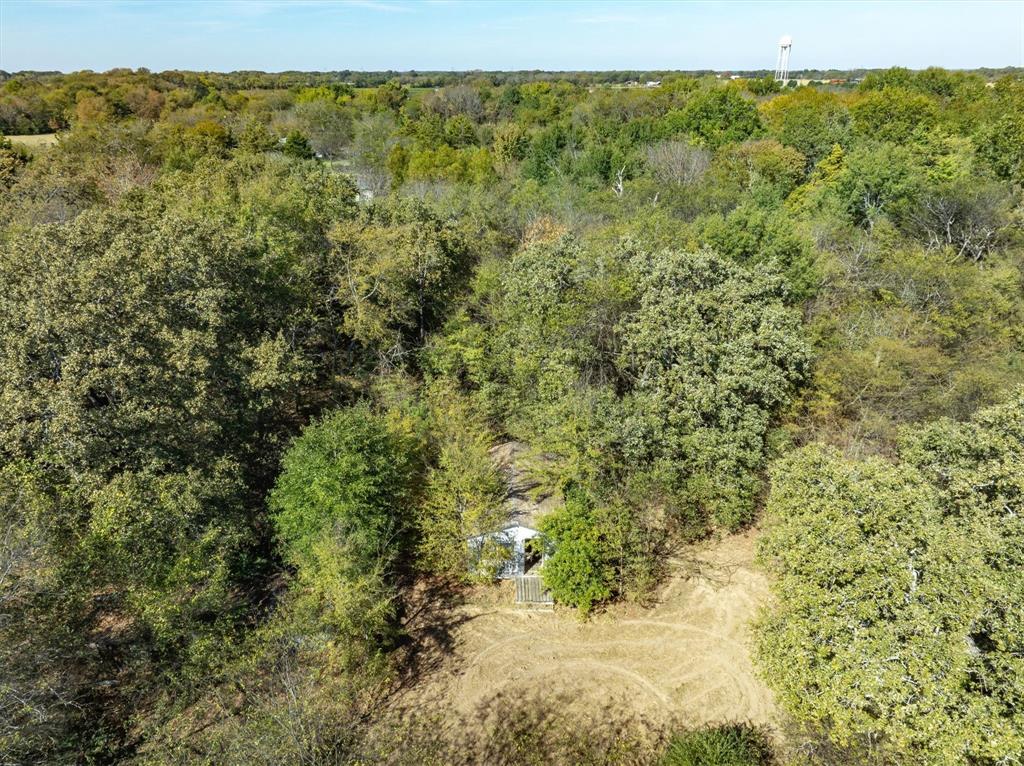 2805 County Road 3507 Wills Point, TX 75169 - Photo 10 of 16 a view of a field with an outdoor space