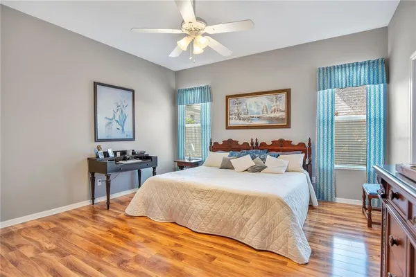 a bedroom with a bed and a table