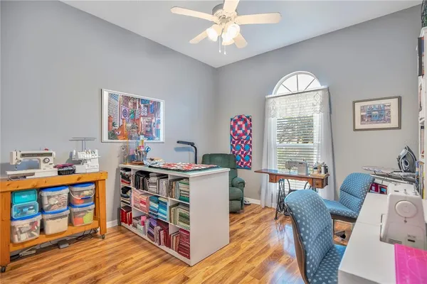 a bed room with furniture and a window