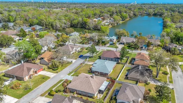 an aerial view of a house having yard