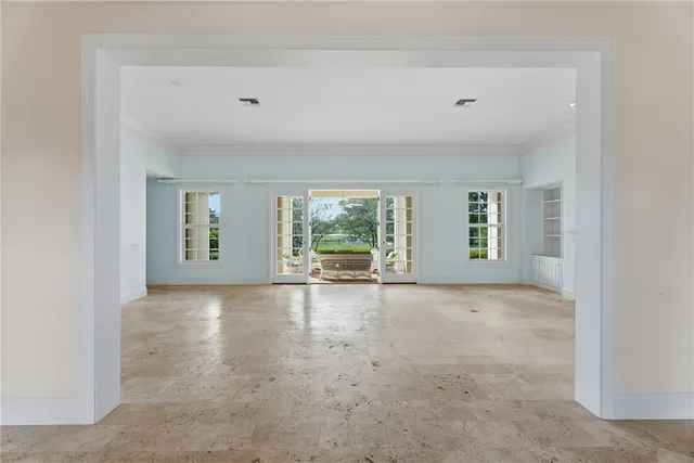 an empty room with windows