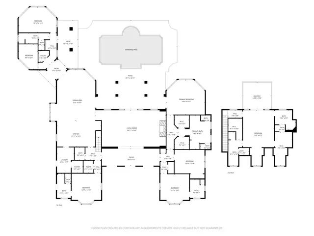 an aerial view of a house with a lake view
