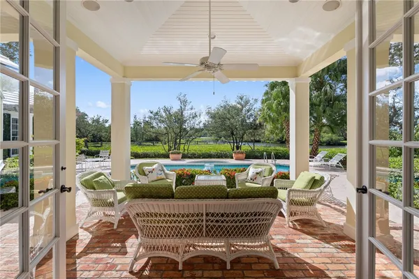 a outdoor living space with furniture and a potted plant