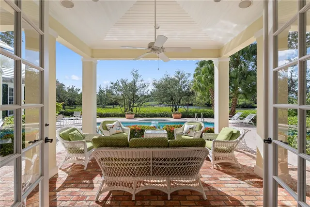 a outdoor living space with furniture and a potted plant