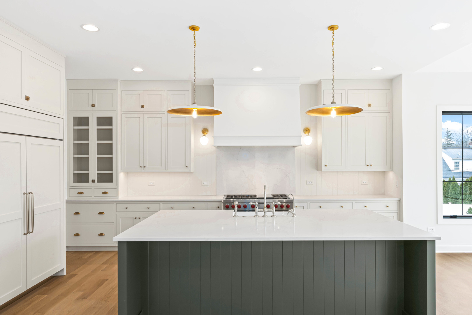 1310 Eagle Street Naperville, IL 60563 - Photo 2 of 38 a kitchen with a sink a counter space and a window