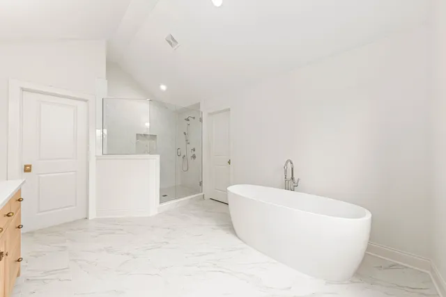 a bathroom with a white tub