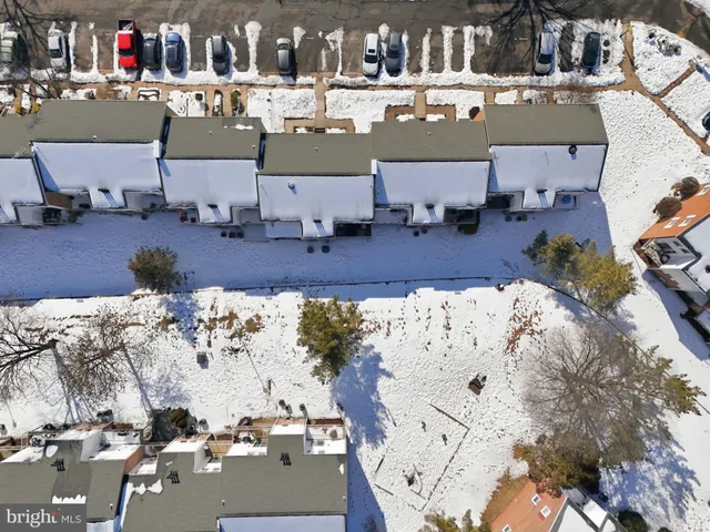 a view of a cafe with sitting area