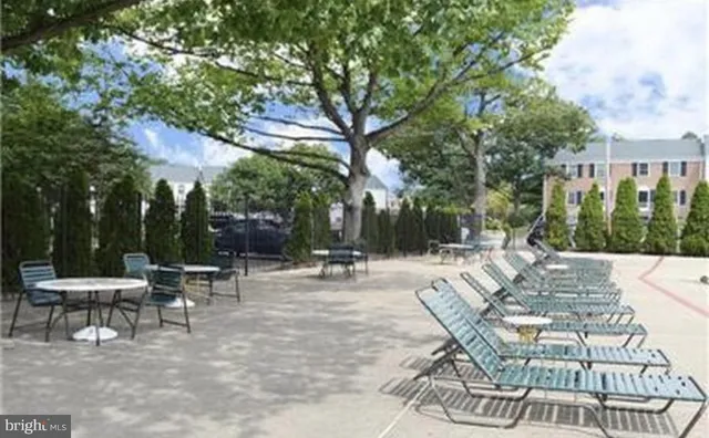 a view of a cafe with sitting area