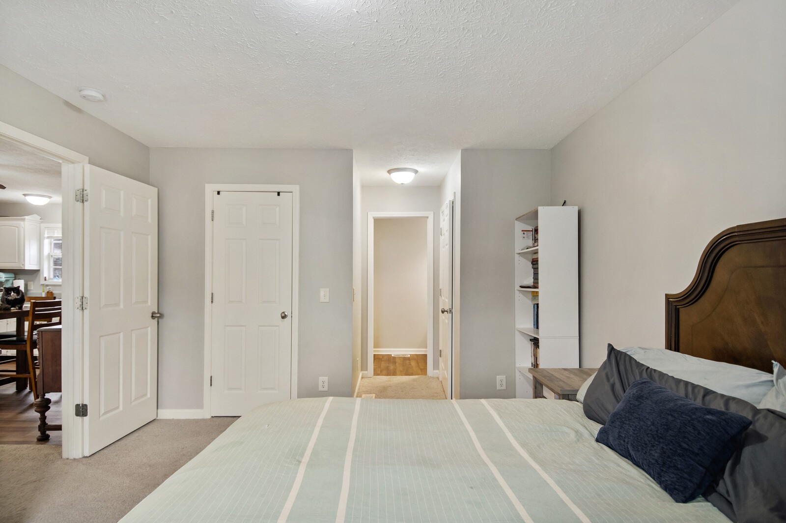 115 Poplar Street Portland, TN 37148 - Photo 15 of 17 a bedroom with a bed and a couch