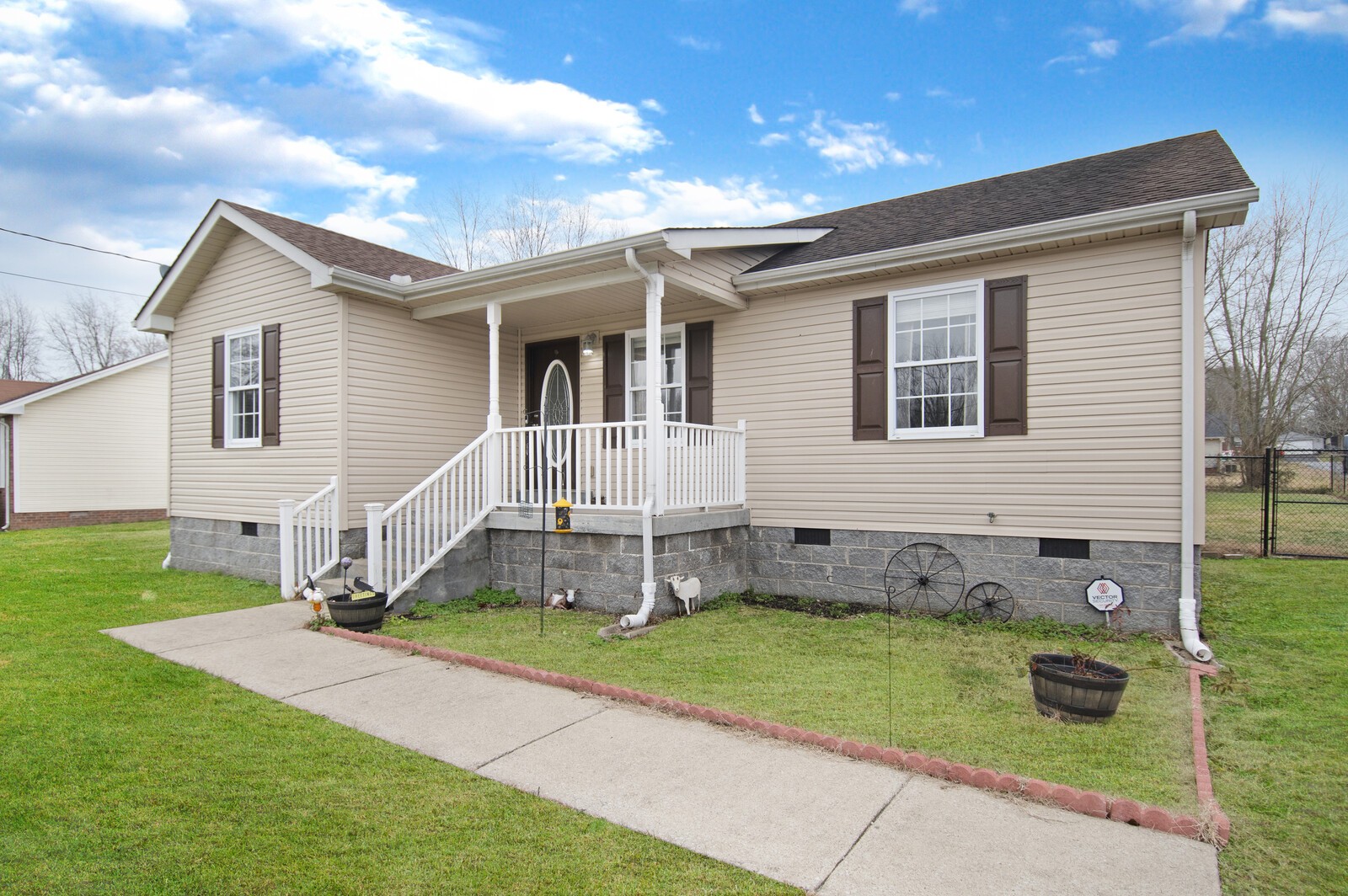 115 Poplar Street Portland, TN 37148 - Photo 2 of 17 a view of house with a yard