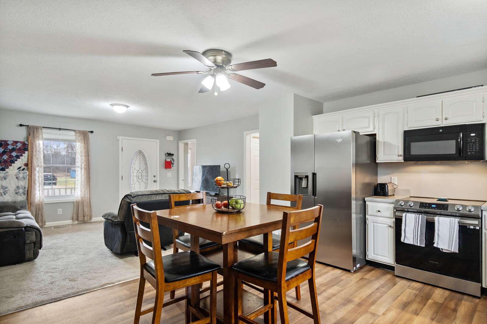115 Poplar Street Portland, TN 37148 - Photo 4 of 17 a dining room with furniture and window