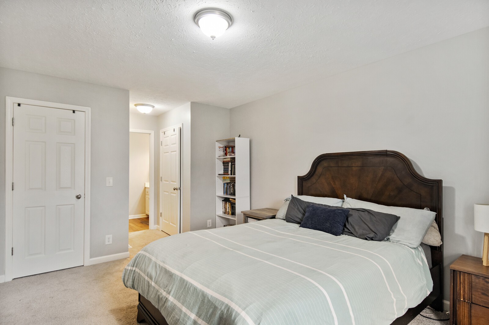 115 Poplar Street Portland, TN 37148 - Photo 7 of 17 a bedroom with a bed and a closet