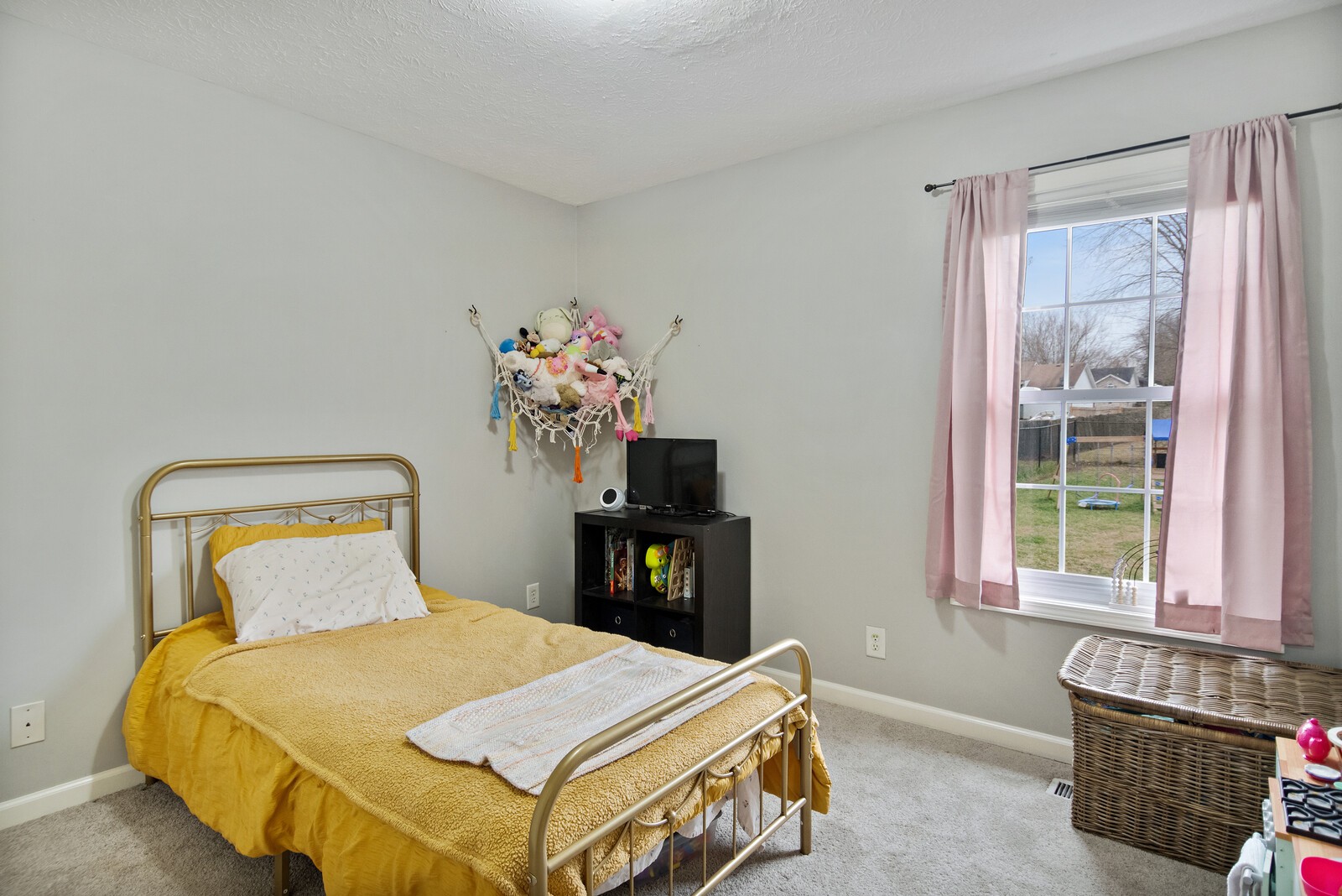 115 Poplar Street Portland, TN 37148 - Photo 10 of 17 a bedroom with a bed and window