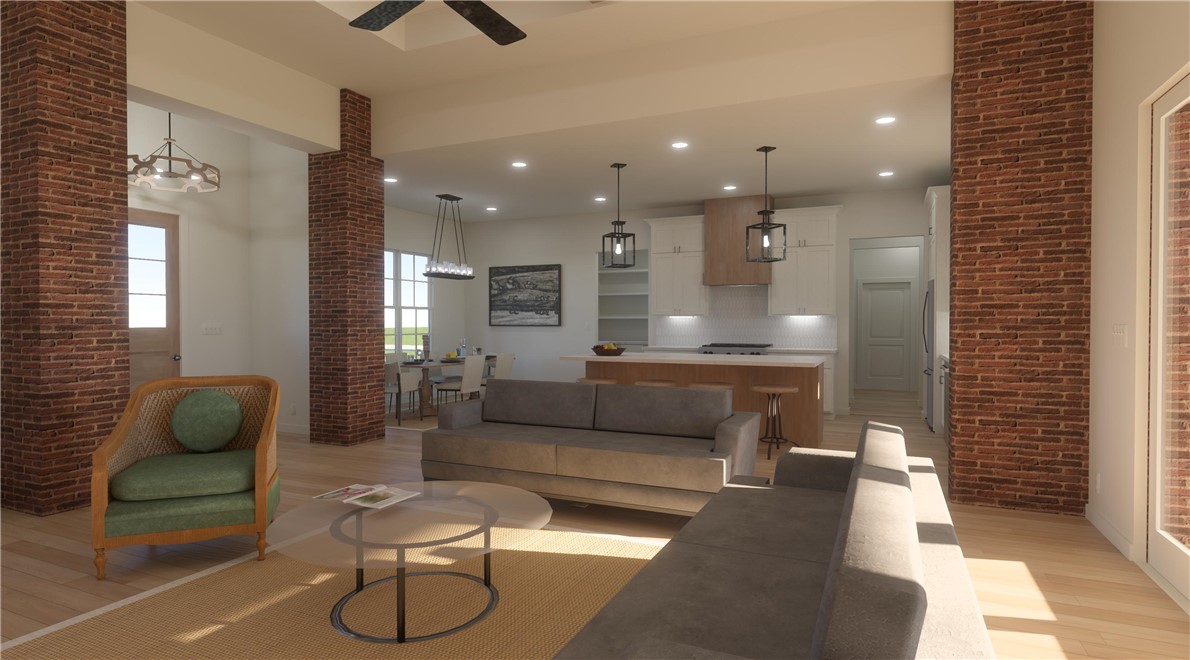 10709 Little Farm Road College Station, TX 77845 - Photo 3 of 7 a living room with furniture and a potted plant