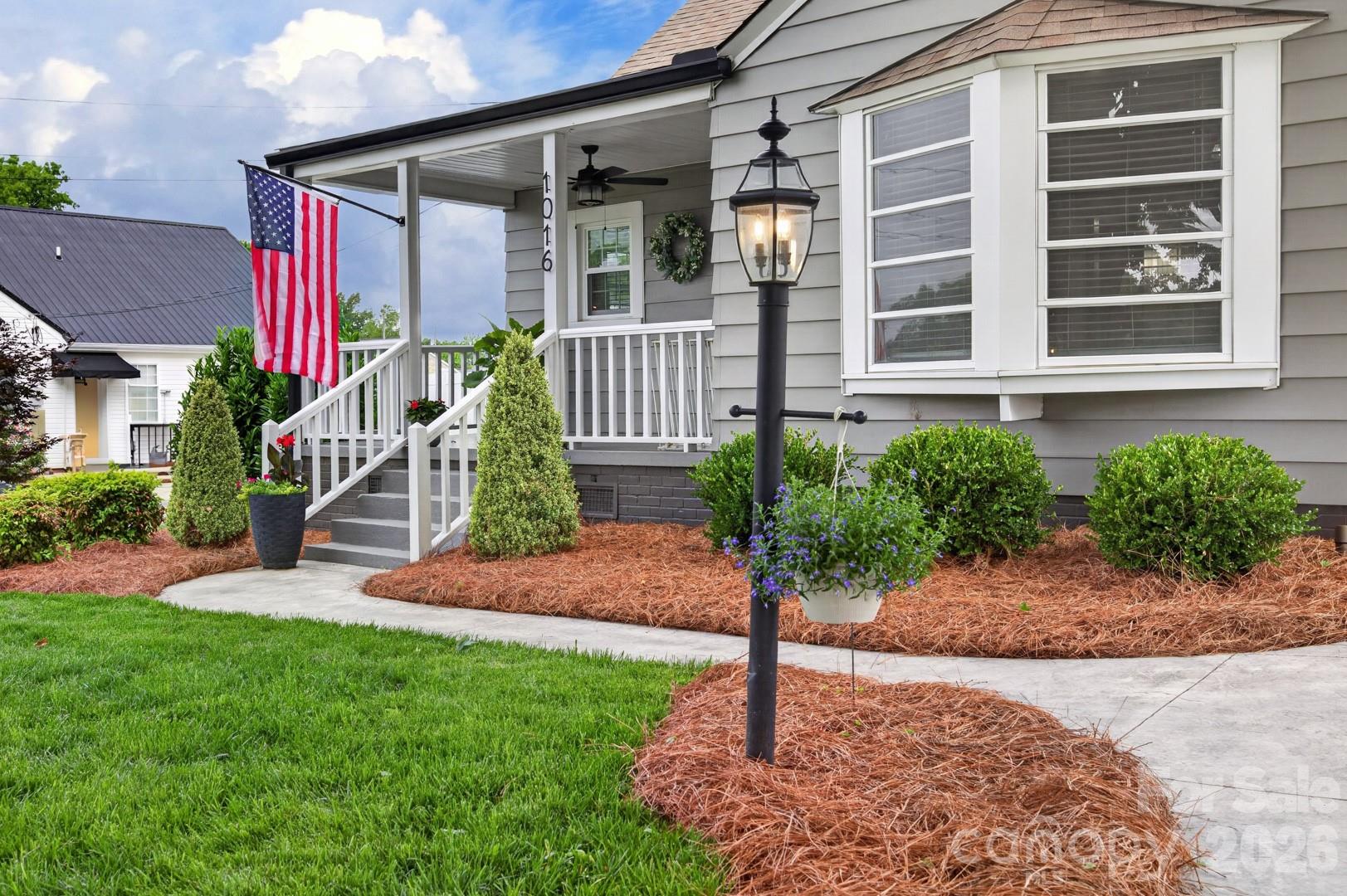 1016 Raney Street Salisbury, NC 28146 - Photo 4 of 45 a front view of a house with garden
