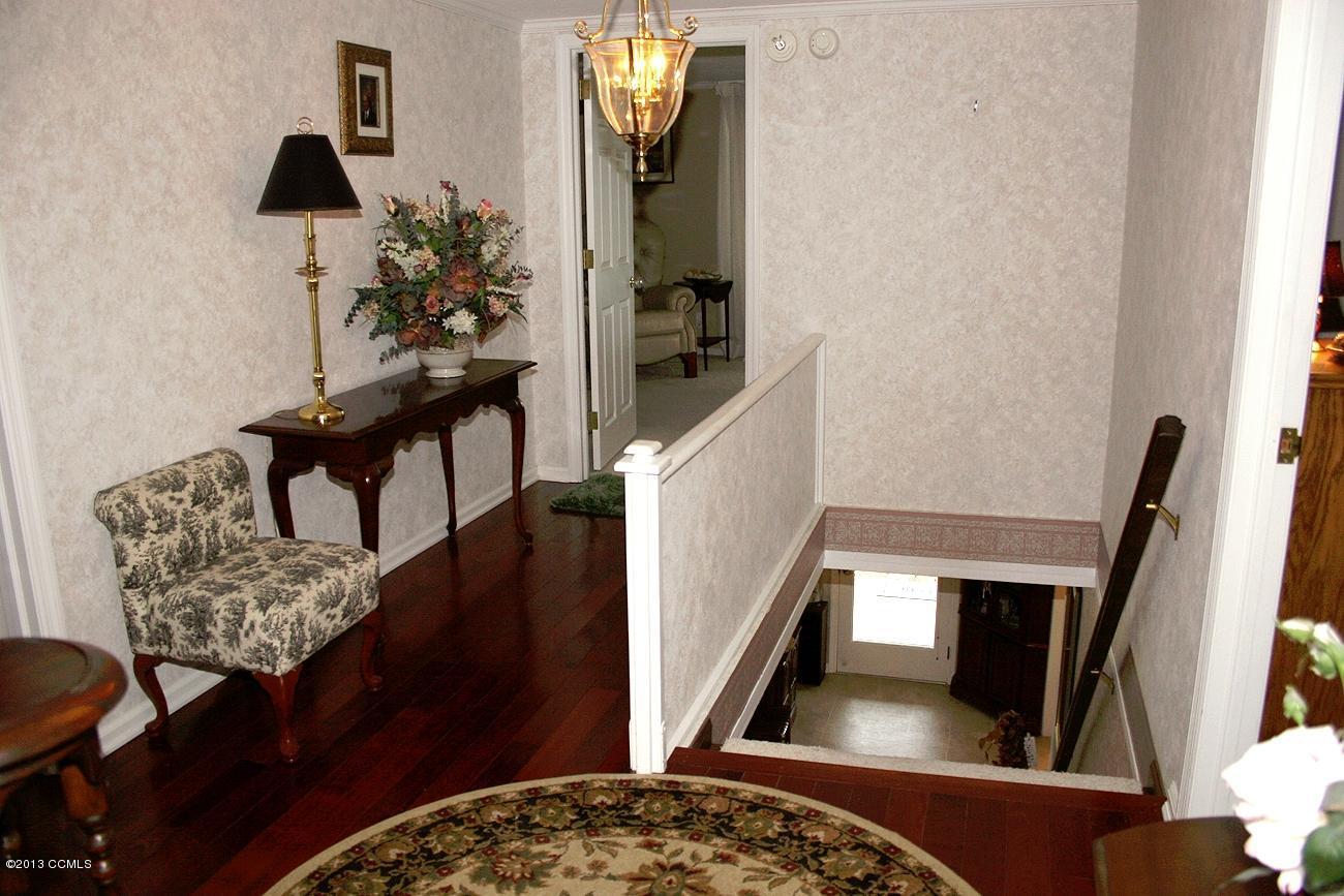 177 Community Road Davis, NC 28524 - Photo 116 of 154 Staircase & Foyer on Second Floor