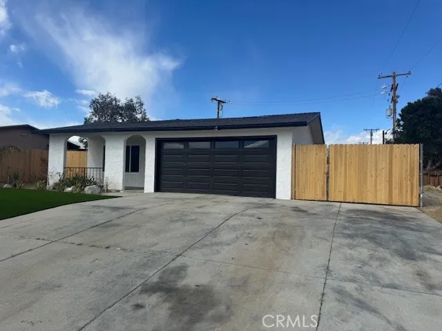 a front view of a house with a garage
