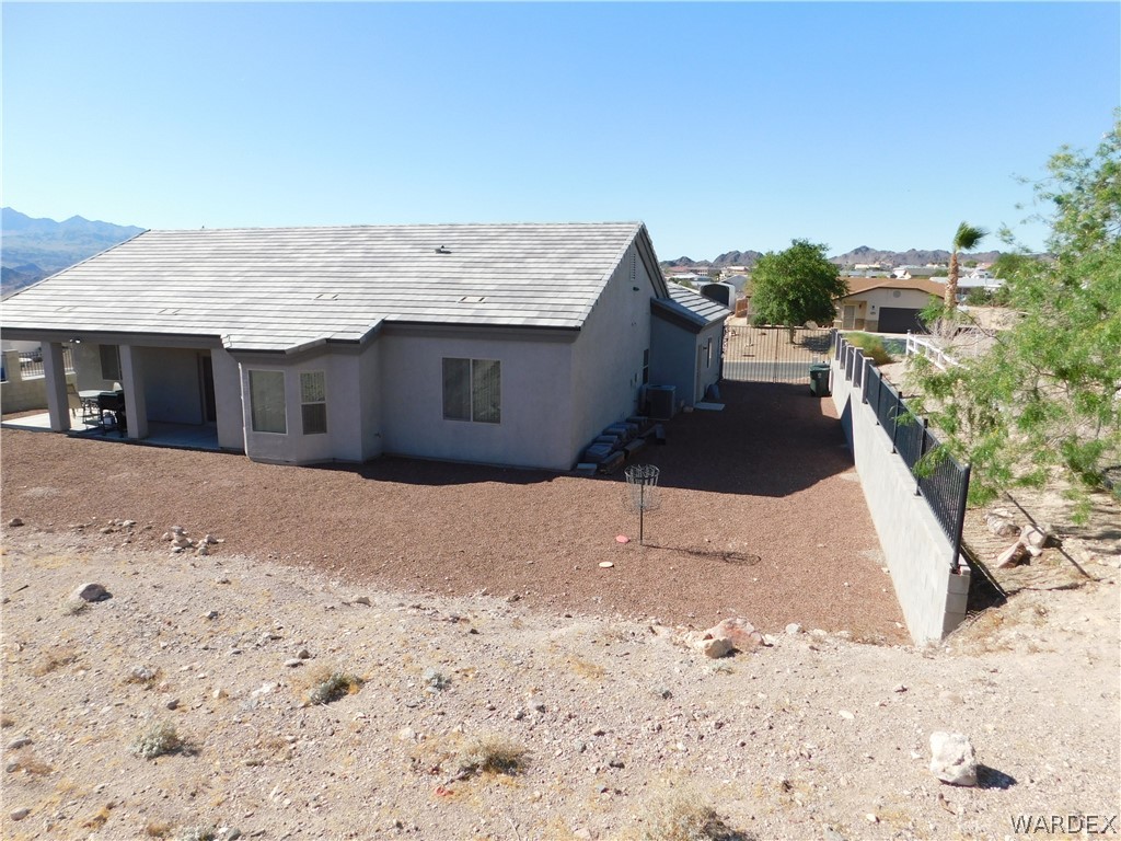 3370 South Ridge Avenue Bullhead City, AZ 86429 - Photo 13 of 56 a view of a backyard of the house