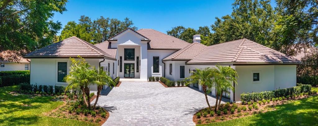 front view of a house with a garden