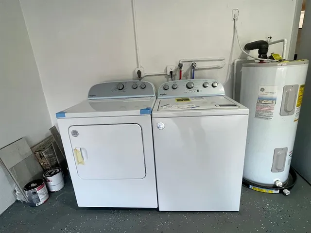 a utility room with dryer and washer