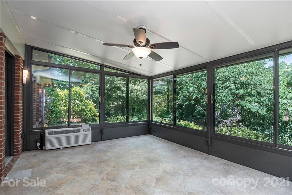 8281 Fairfield Forest Road Denver, NC 28037 - Photo 22 of 30 a view of an empty room with a large window