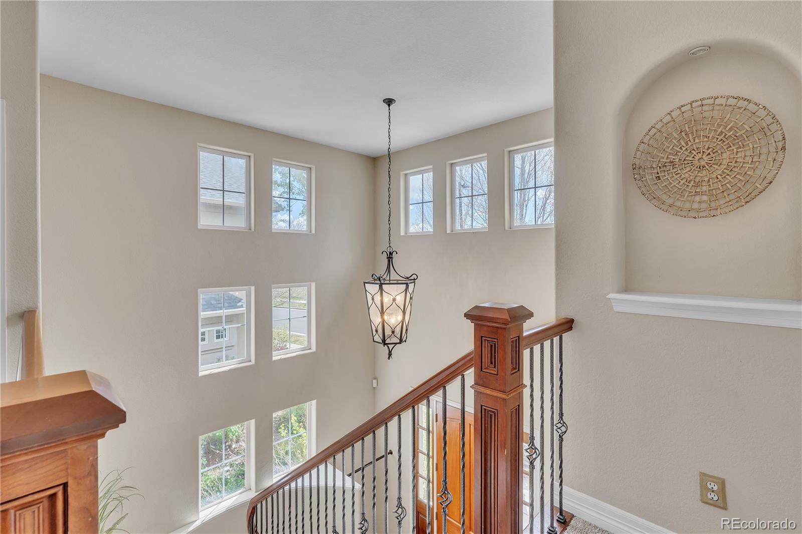 8053 East Maple Avenue Denver, CO 80230 - Photo 20 of 49 a view of a hallway with windows