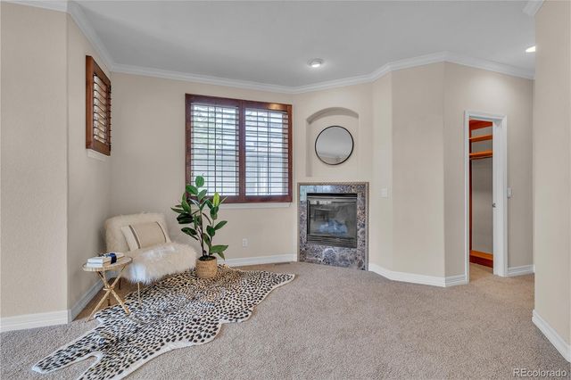 an empty room with furniture and view
