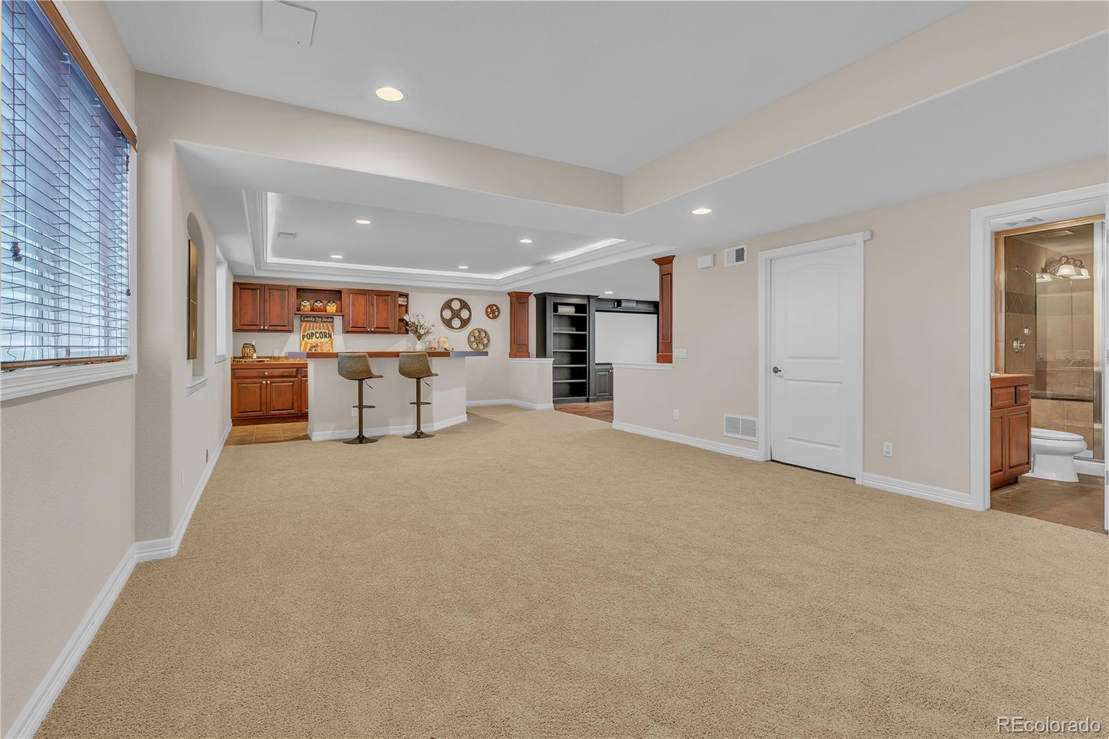 8053 East Maple Avenue Denver, CO 80230 - Photo 36 of 49 an empty room with furniture and view