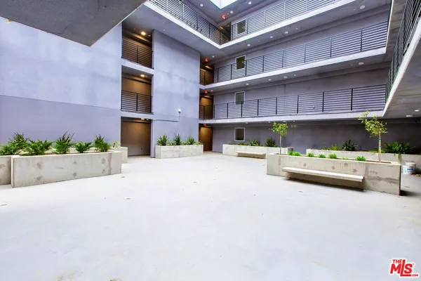 a view of a building with a street