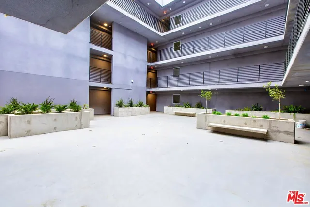 a view of a building with a street