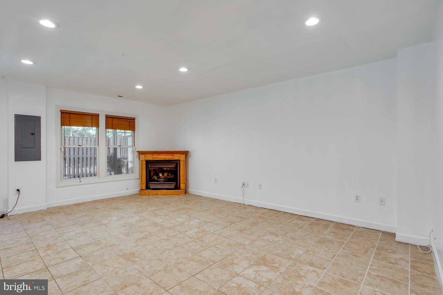 6248 Levi Court Springfield, VA 22150 - Photo 27 of 51 Spacious basement family room with natural light.
